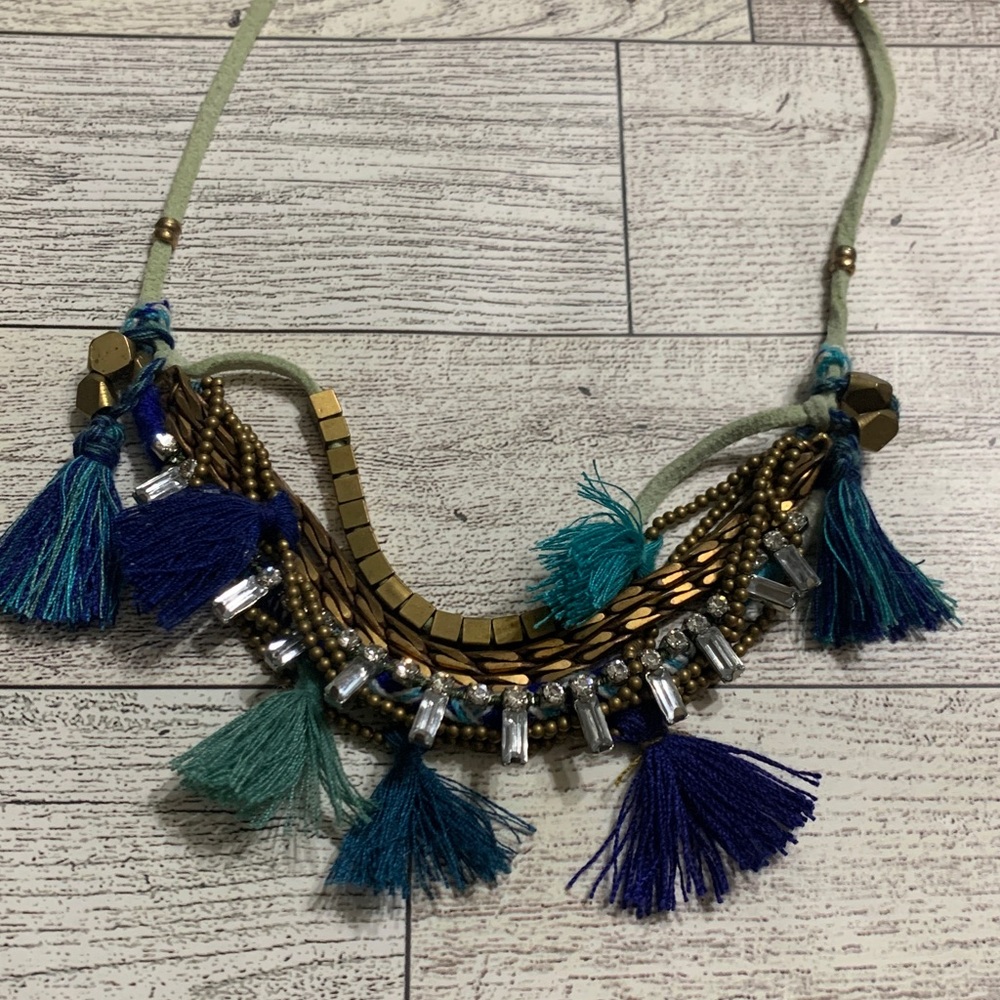 DANCING TASSELS.. Gold metal & Crystals adjustable leather strap necklace
